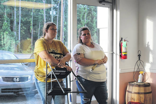 Willow & Vine owners Brittany Smith Powell and Hailey Brock Howell discuss how to decorate their new boutique which is set to open the first week of October.
                                 Liz O’Connell | The Anson Record