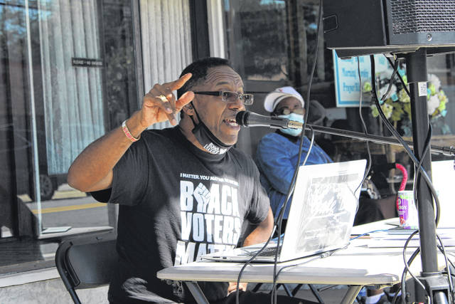 Curtis Gatewood energizes the crowd during the Black Voters Matter national bus tour in Morven on Oct. 1.
                                 Liz O’Connell | Anson Record
