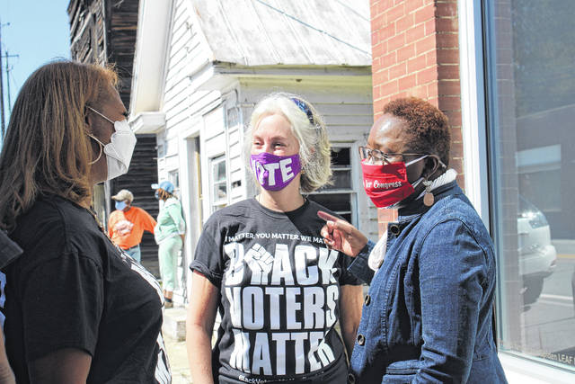 Democratic Congressional nominee Cynthia Wallace joins and talks with citizens about current issues and the importance of voting during the Black Voters Matter tour in Morven on Oct. 1. 
                                 Liz O’Connell | Anson Record