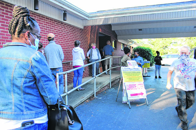 Anson Record file photo
                                Voters wait in line on the first day of early voting.