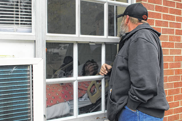 Kent Gillis visits his wife daily at the Wadesboro Health and Rehabilitation facility while she recovers from a deadly stroke.