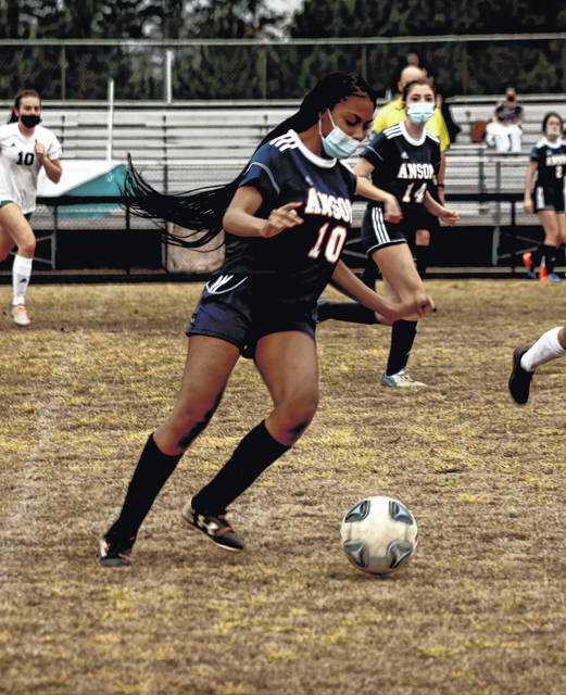 The girls soccer team plays with better defense and passes during a home game on March 24.
Liz O’Connell | Anson Record