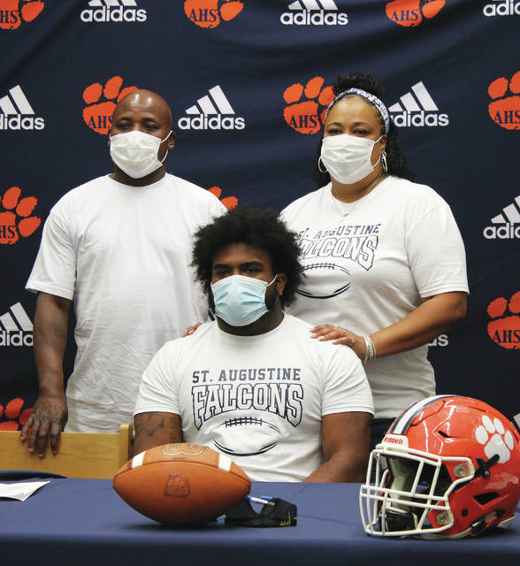 Jaydn Dickens is joined by his parents on April 14 for his college commitment signing day.
Liz O’Connell | Anson Record