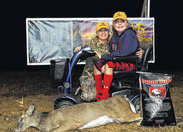 Participants show off their kills.
                                 Contributed photo