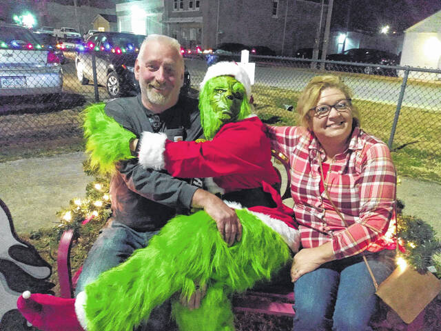 Sherri and Chuck Cook pose with the Grinch.
Contributed photo