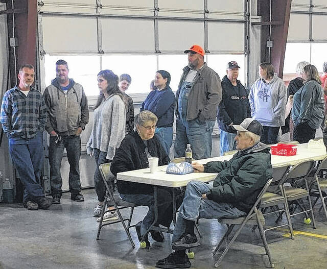 A crowd lines up for the BBQ.
                                 Hannah Barron | Anson Record