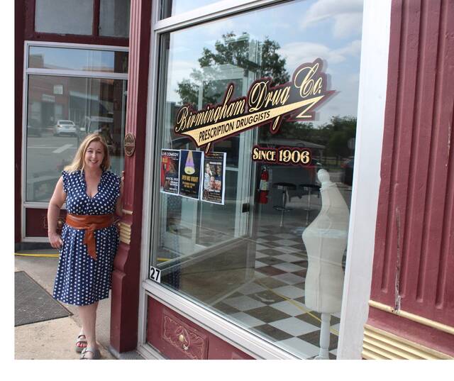 Stephanie Al-Zubaidy stands proudly in front of the new Birmingham Sweets
Matt Lamb | Daily Journal