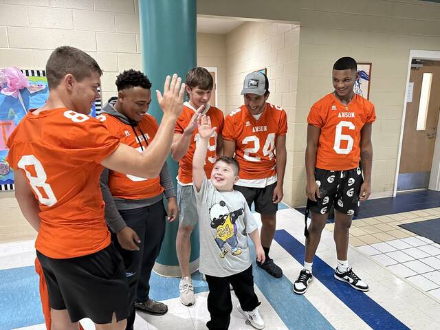 A Lilesville Elementary student leaps up for a high-five.
Photos courtesy of Anson County Schools