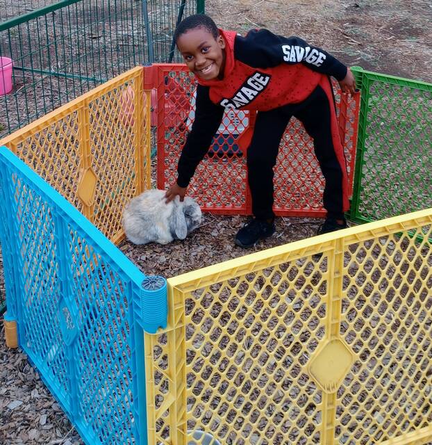 Jayceon Pratt was spotted petting the bunnies and feeding the other animals the Ag Department graciously had on site for attendees to enjoy and experience.