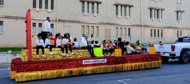 Morven Elementary School decked out their parade float in lots of holiday bling.
                                 Lauren Monica | Anson Record