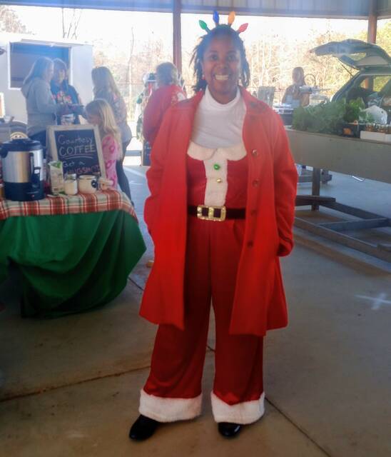 Ansonvilles Mayor-Elect, Angela Caraway, helped Santa spread holiday cheer at the Grand Finale of Ansons Farmers Market on Saturday, December 9. Caraway will be handing out even more goodwill on December 20, starting at 9 a.m., at the Caraway Foundation. Food for families in need this holiday season will be given out, first come first served.