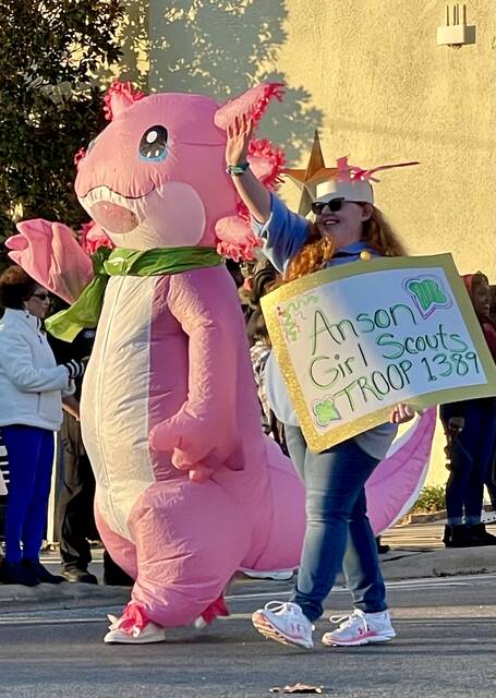 This year the Girl Scouts participated in many local events, such the Uptown Wadesboro Christmas Parade, MLK Parade, and Young Professionals of Anson Day of Caring. Pictured is Cheyenne Hassell and this year cookie mascot, A. Rosada the Axolotl at the Uptown Wadesboro Christmas Parade.
Photo courtesy of Laura Laney