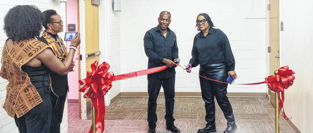 Ribbon cutting on Anson County native Dr. Florita Bell Griffins AI generated art exhibit All We Need Is Love took place at the first of a trilogy series History of Soul Music.
Lauren Monica | Anson Record