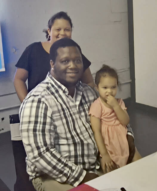 Brandon Freeman and his daughters Fynlee Freeman and Rylee Freeman
                                 Lauren Monica | Anson Record