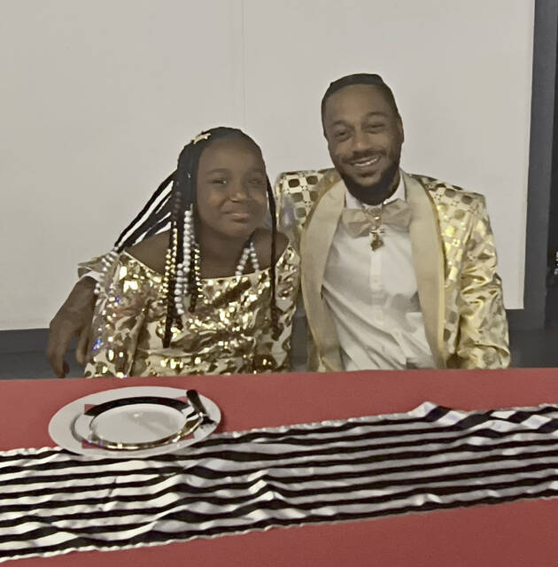 Clifton Smith and his daughter Mlayah Smith
                                 Lauren Monica | Anson Record