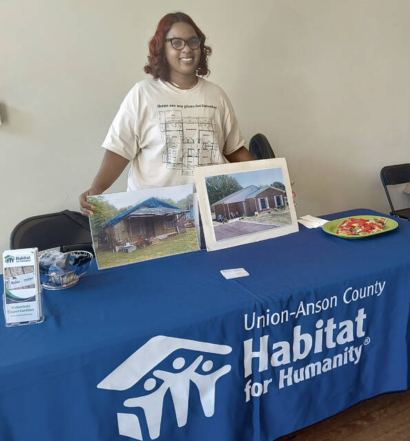 Habitat for Humanity provided visual images for attendees of homes the group has either torn down and rebuilt or renovated to make the home more comfortable for those whose hearts resides there. The non-profit group seeks to help people apply for loans and give existing homeowners a quality home to maintain.
                                 Lauren Monica | Anson Record
