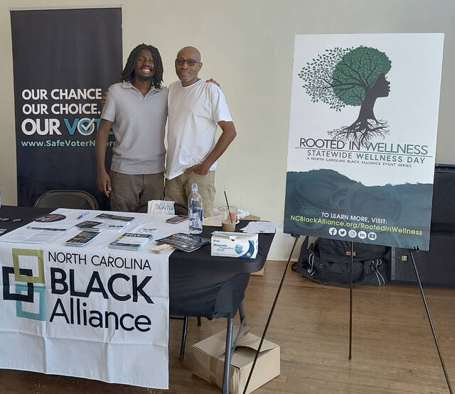 Julius Vernon (pictured left), who is with Black Alliance, was proud to be taking part in the groups state-wide fair.
                                 Lauren Monica | Anson Record