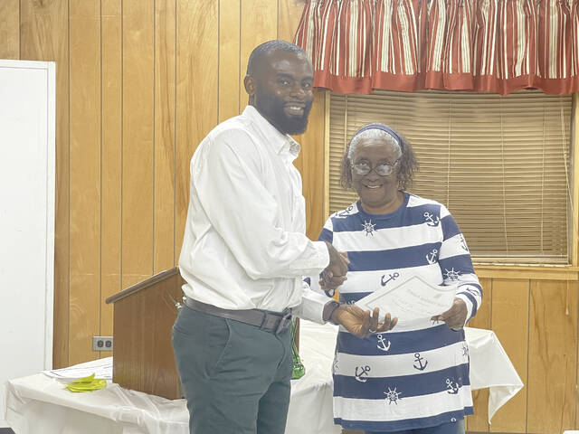 Picture left to right is Samuel Cole, Jr. Anson County 4-H Agent, and Betty Garris, Anson County 4-H Volunteer Leaders President.