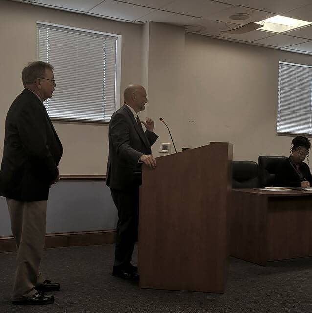 Anson County schools Board of Education chair (left) Dr. George Truman and Superintendent of ACSs Dr. Brain Ratliff updated commissioners in the new middle schools progress.