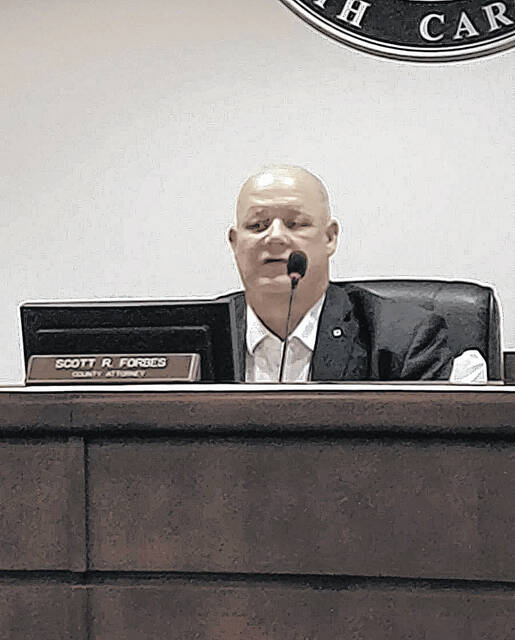 County Attorney Scott Forbes.