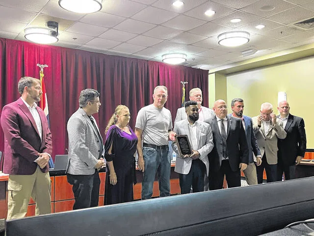 Anson County Assistant Utilities Director Chris Harrington presented the Richmond County Board of Commissioners with a plaque in appreciation for the countys assistance during Anson Countys July water crisis.
Ana Corral | Richmond Daily Journal